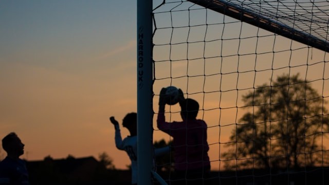 Men playing football